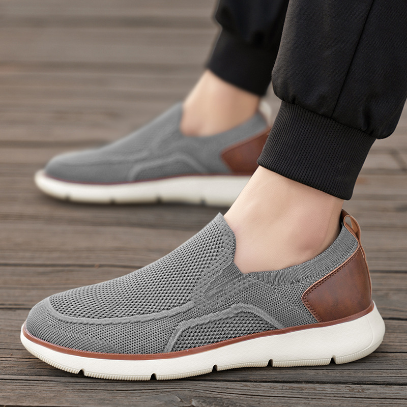 Nuevos zapatos de moda casuales retro transfronterizos de gran tamaño transpirables de malla voladora para niños con un pie zapatos de hombre ligeros y antideslizantes