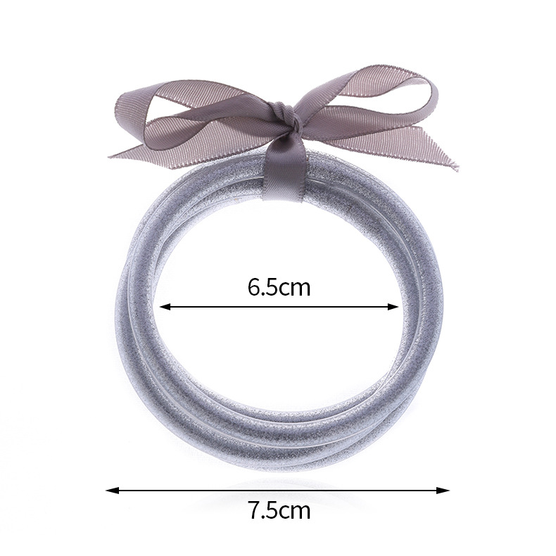 Casual Simple Style Solid Color Bow Knot Plastic Silica Gel Gold Foil Women's Wristband display picture 2