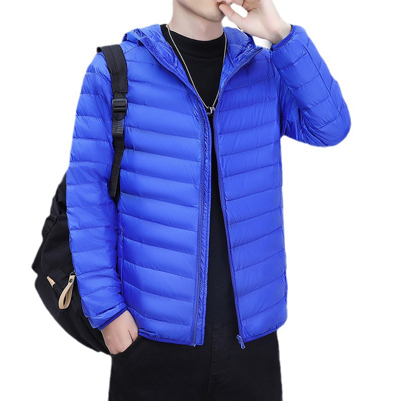 2023 Otoño e Invierno ligero abajo abrigo de algodón acolchado con capucha de los hombres regular más el tamaño abrigo de moda entrega de una sola pieza de los hombres