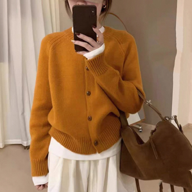 Corea del Sur 2025 otoño y invierno nuevo estilo extranjero V-cuello grueso aguja floja de color sólido jersey de punto suéter