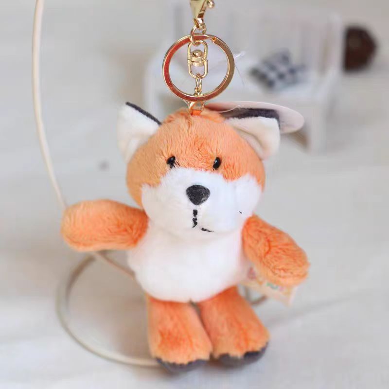 Nuevo transfronterizo jungla animal llavero elefante león colgante juguetes de peluche decoración bolsos llavero al por mayor