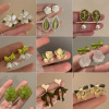 Fresh green ear clips, small design earrings, wide color palette, no pierced ears, wholesale