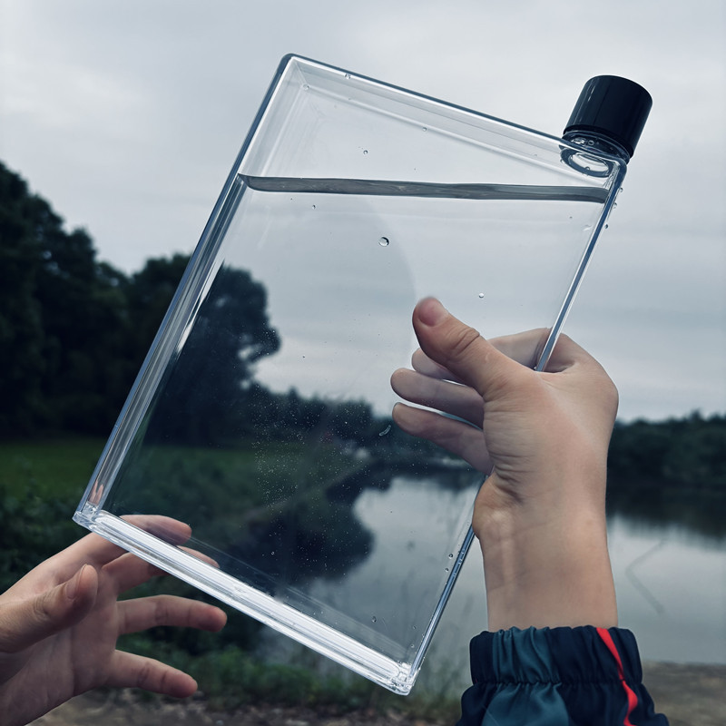 Regalo creativo taza de plástico plana A5 papel taza de agua estudiante deportes taza de mano al por mayor A6memo hervidor de agua fabricante