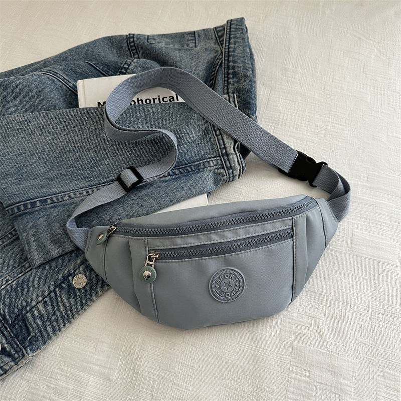 Nuevo nicho de diseño de bolso de cintura para hombres tendencia de personalidad estética 2024 verano almacenamiento de teléfonos móviles bolso de pecho de aire deportivo