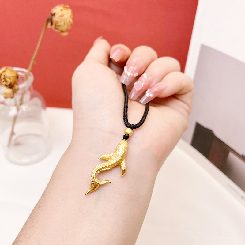 Vietnam arena oro pequeña ballena negro cuerda collar año por año peces chapado en oro Yiwu joyería al por mayor en vivo sala de transmisión colgante caliente