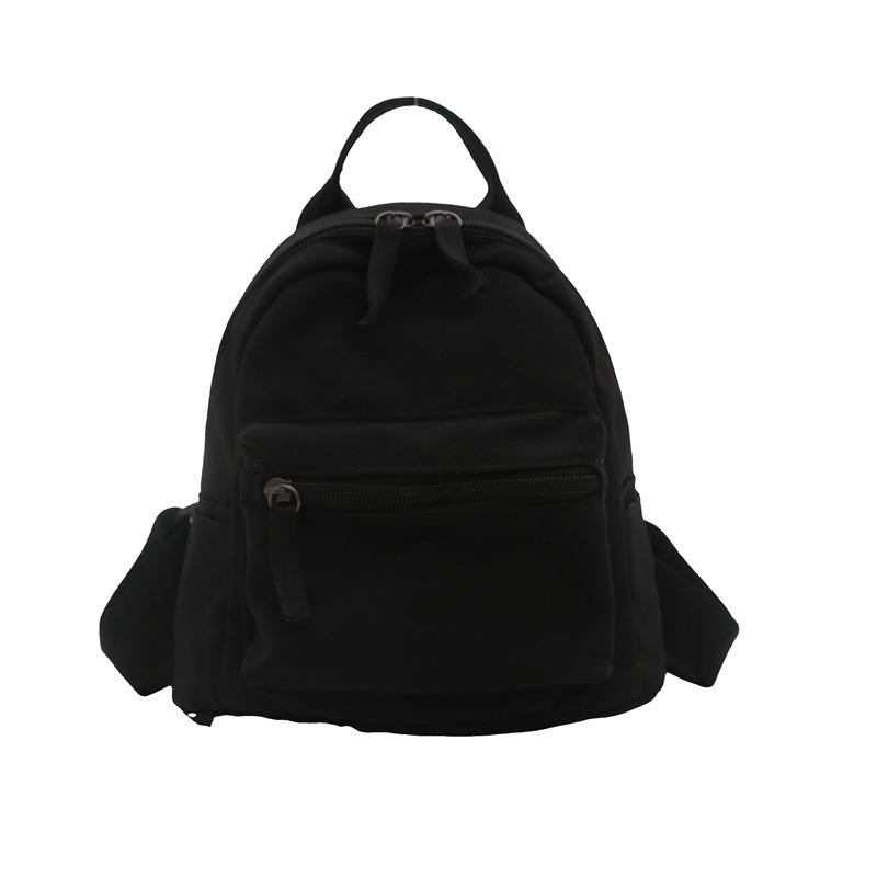 Mini mochila casual simple para mujeres 2024 nueva moda bolso de color sólido pequeño fresco mochila de viaje de estudiantes