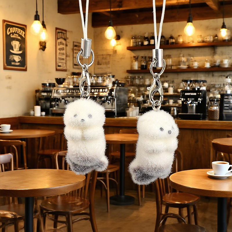 Ventas transfronterizas en caliente flocado tridimensional nutria cadena de teléfono móvil adorable colgante de peluche de animales llaveros de jóvenes corazón viento