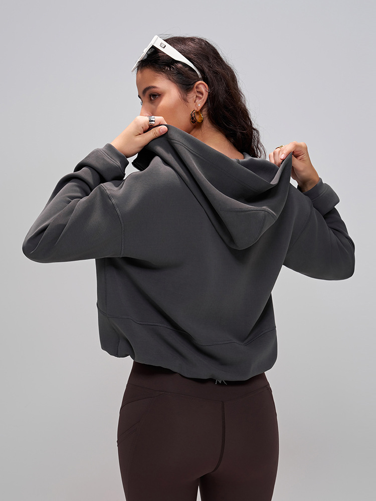 Primavera y otoño de mangas largas camisetas deportivas encapuchadas mujeres cintura doblada chaqueta de fitness para correr al aire libre chaqueta casual