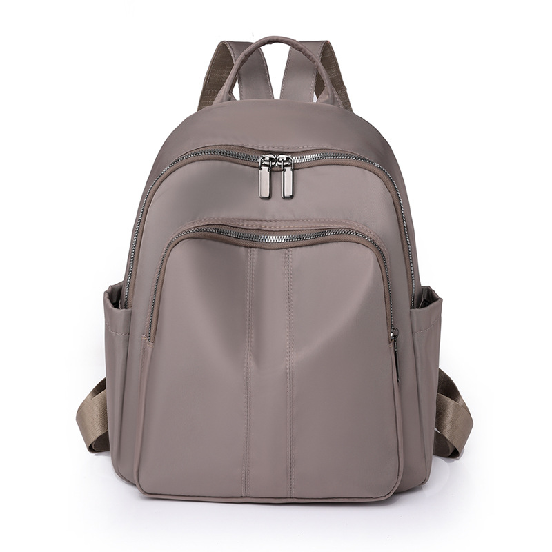 Spot al por mayor 2023 otoño nuevo estilo casual damas mochila de nailon al aire libre mochila de viaje ligera mochila escolar