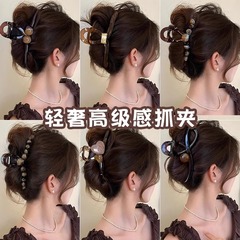 髪のボリュームの多い女性向けの軽くて高級感のあるハイエンドのヘアクリップ、後頭部のヘアクリップ、大きなヘアクリップ