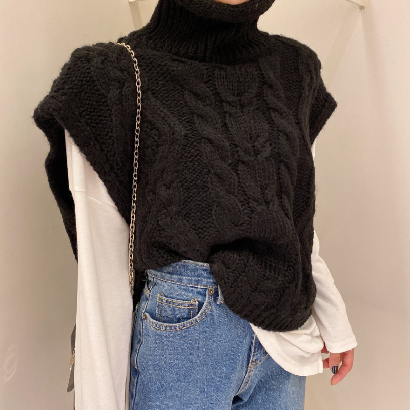 高襟の馬甲の女性の頭はゆったりしています。|undefined