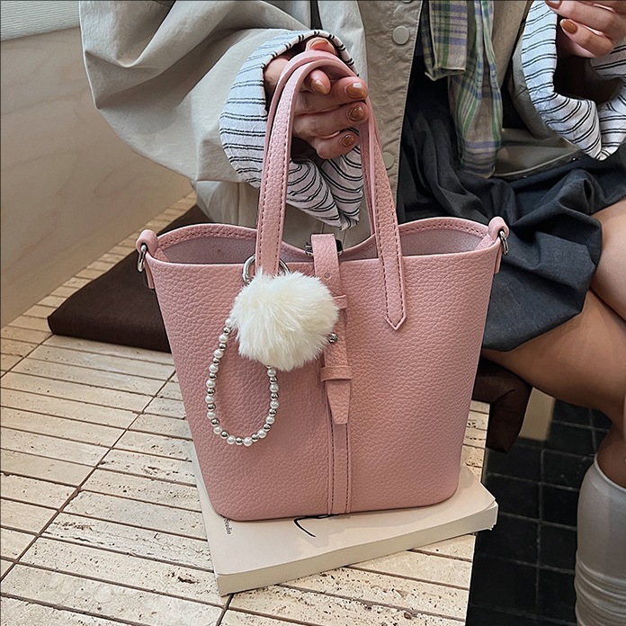 Nicho transfronterizo bolsas de cestas de verduras bolsas de cubo de mano otoño / invierno 2025 nuevo bolso de mujer moda retro mochila de hombro