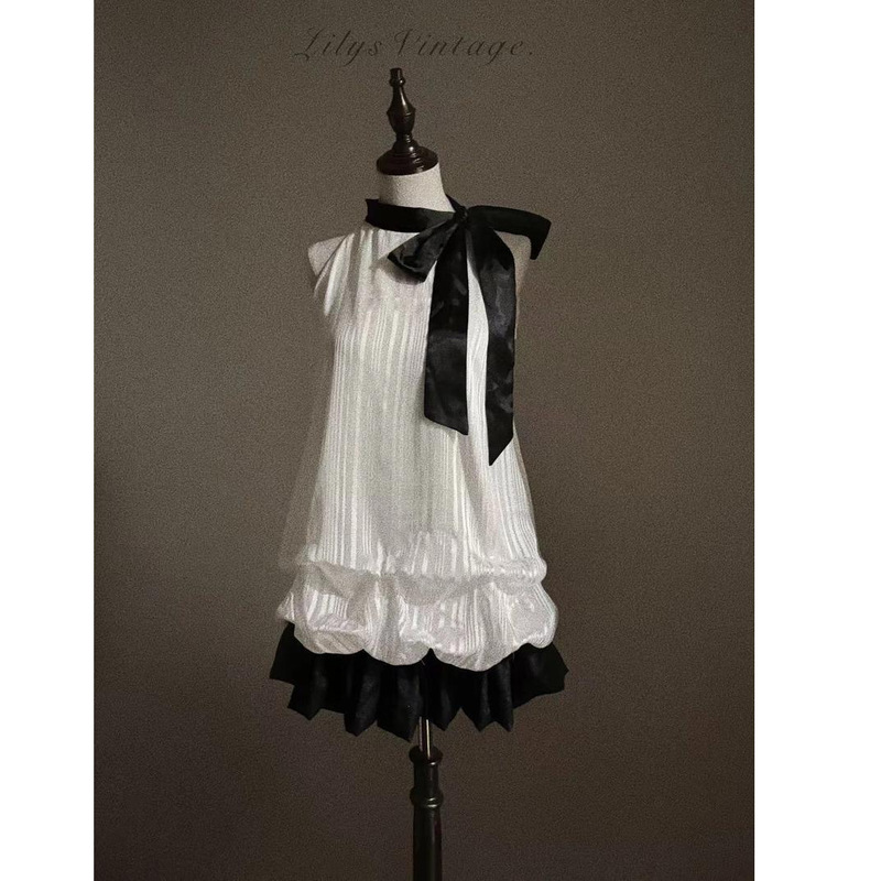 女性用の高級感のある娘風のおしゃれな洋服、甘いホルターネックのつぼみドレス、蝶結びのスプライシングショートスカート|undefined