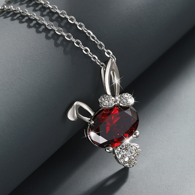 Xupe joyería japonesa y coreana de dibujos animados lindo conejo colgante hembra luz nicho de lujo de alto grado con incrustaciones de Gema artificial colgante