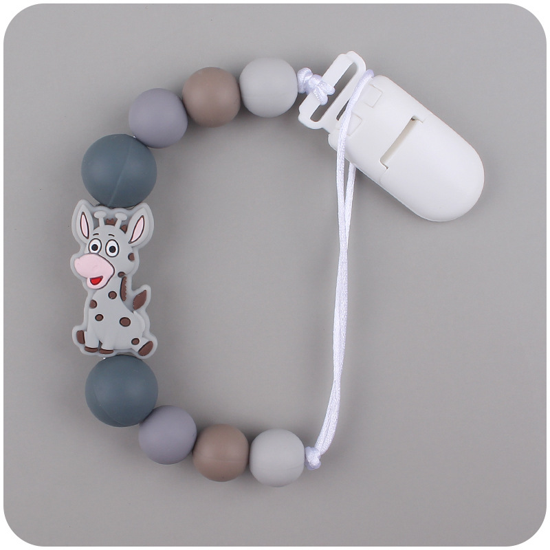 Nuevo bebé suministros chupete cadena creativa de dibujos animados jirafa silicona bebé mordedura cadena anti-caída molar