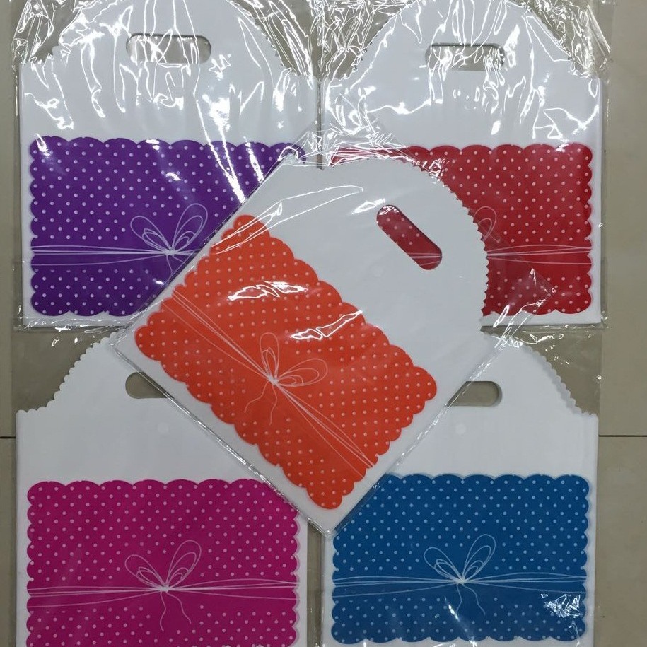 30*40cm弧形挖孔礼品袋弧形手提袋加厚服装袋塑料购物袋50个每包
