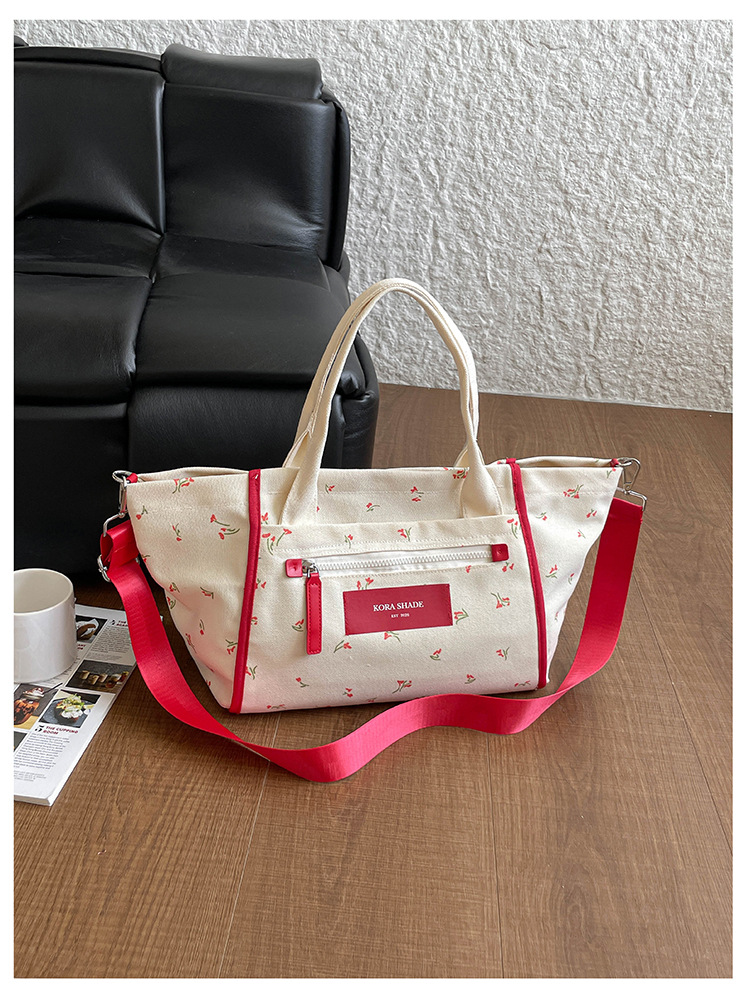 Bolso de lona de gran capacidad para mujeres 2026 nuevo tipo de mochila de hombro simple y casual para la clase de la bolsa de viaje