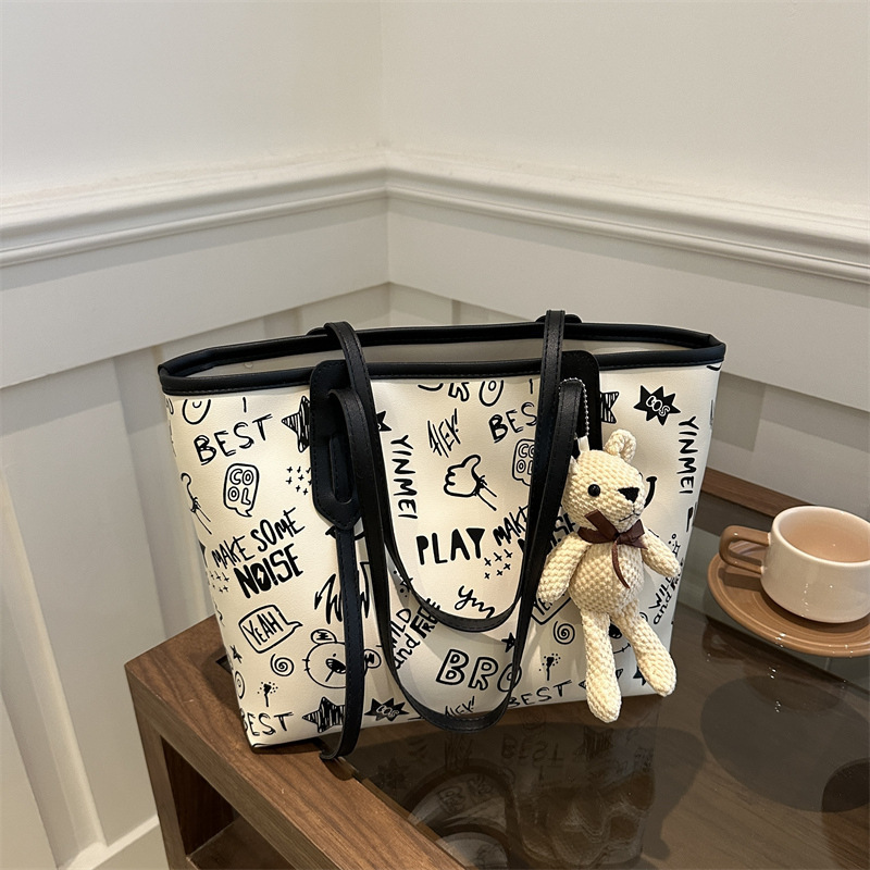 Cute casual oso estampado de gran capacidad 2024 nuevo estilo simple viajero de un solo hombro bolso portátil para estudiante bolso femenino