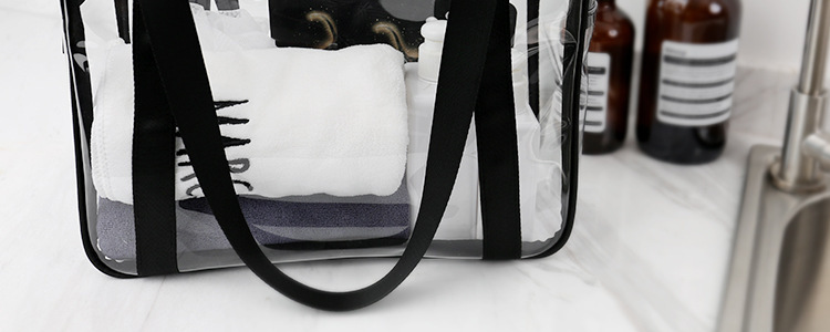 Transparent PVC Tote Bag Large Capacity Waterproof Zippered Jelly Bag Foldable Storage Handbag in use