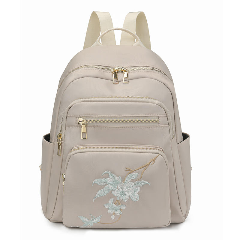 Mochila bordada para mujer 2024 nuevo estilo salvaje para mujer mochila de viaje ligero de viaje de gran capacidad de moda