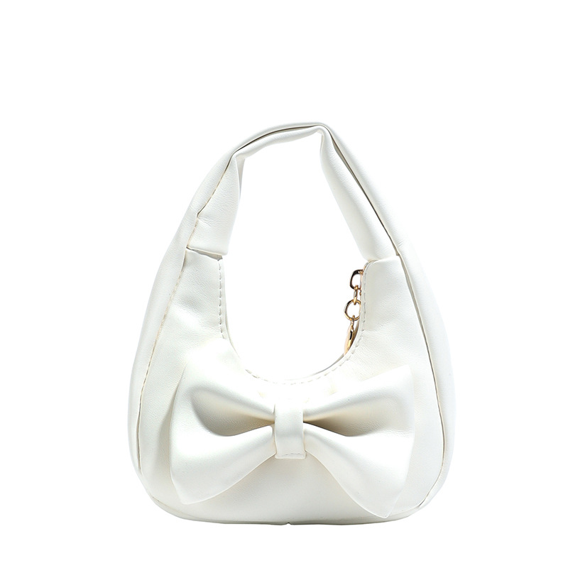Dolce y lindo arco bolso de niña exquisita mini bolso de cambio de bebé 2025 bolso infantil transfronterizo