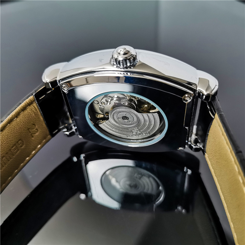 Barril de vino Reloj mecánico automático hueco-hacia fuera transparente azul claro vidrio luminoso de cuero impermeable de los hombres hebilla de mariposa Mesa multifunción
