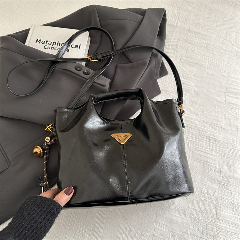 2024 alto valor retrógrado estilo de negocios Meillard bolso de cubo de mano de viaje versátil de invierno nuevo bolso de hombro