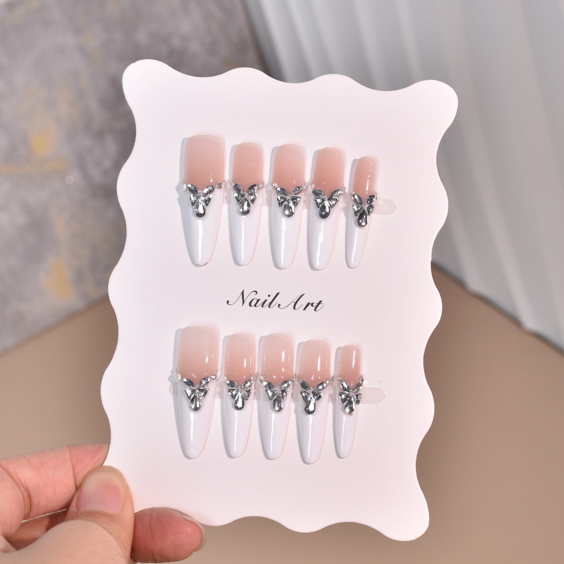 Uña pura mano alta sensación blanca francesa parche de uñas parche de uñas fabricantes al por mayor parche de uñas falsas