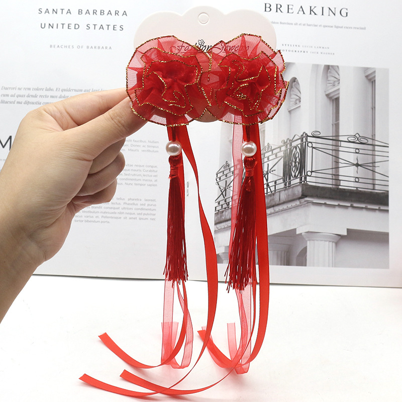 Children's hair accessory with tassels