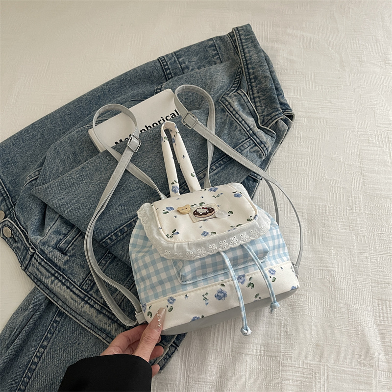 Japón dulce puro deseo mochila de encaje 2025 nueva chica coreana encantadora viaje flor pegatinas mochila pequeña