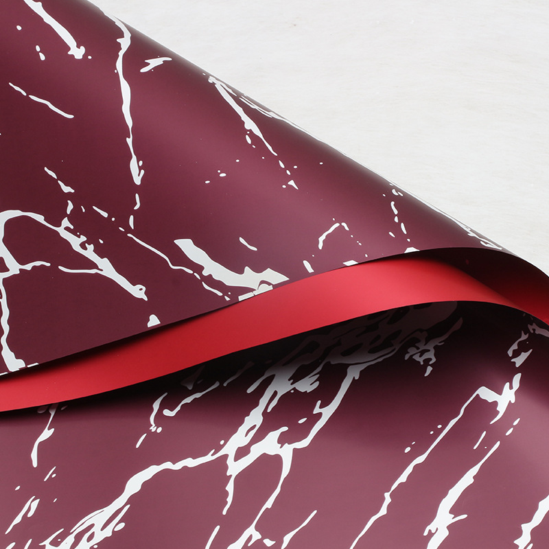 Huaxi Ouya Paper Mármol Papel de embalaje de flores Impresión engrosado Papel de flores impermeable Florería Ramo de flores Embalaje floral