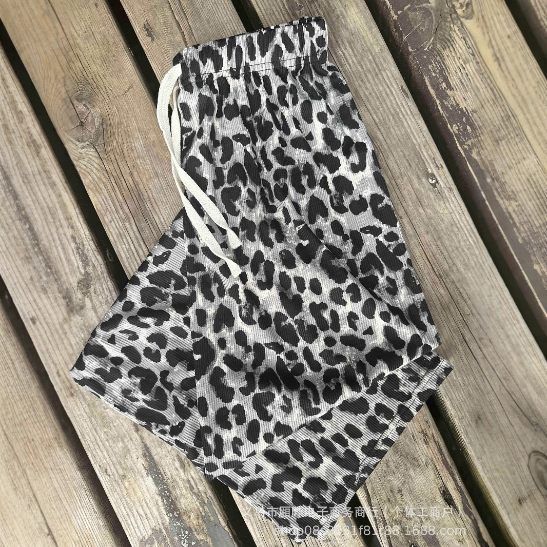 Nuevo estilo estampado de leopardo mujer verano fino estampado pantalones anchos mujer cintura alta fina seda de hielo estilo explosivo suelto drapeado hielo