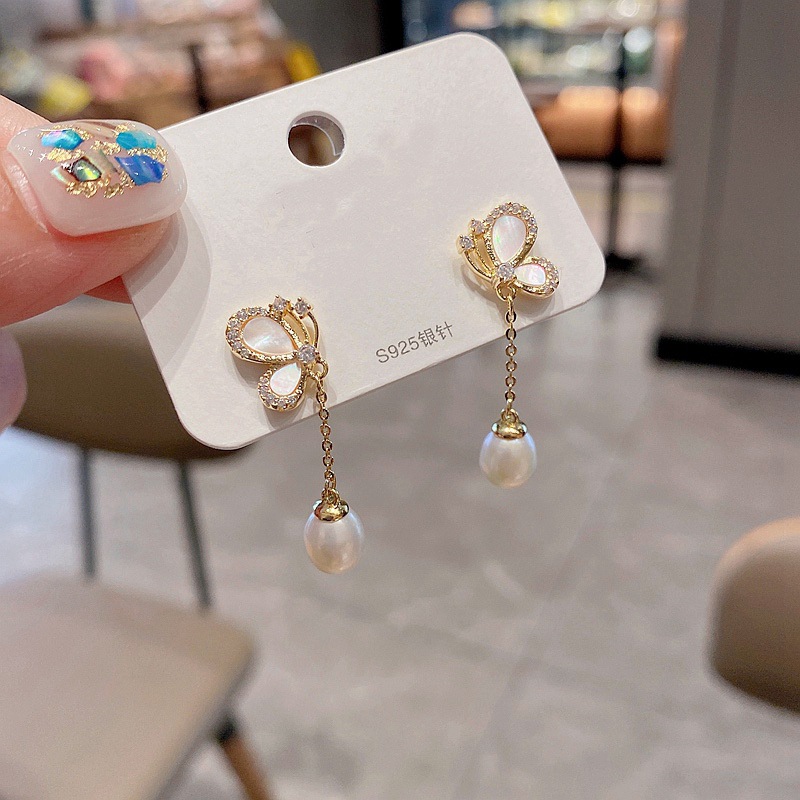 Nihaojewelry Korean Style Butterfly Pearl Tassel Copper Earrings Wholesale Jewelry display picture 6