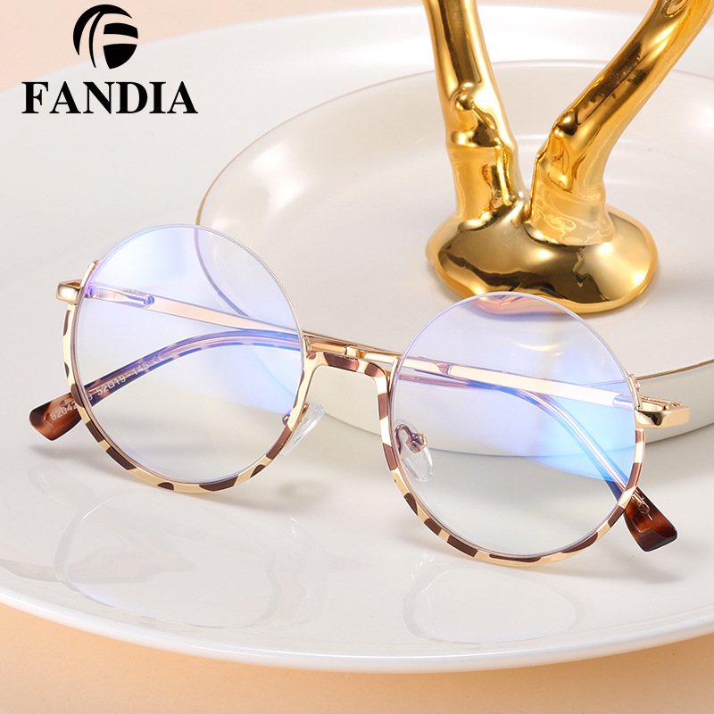 82042 europeo y americano nuevo metal marco redondo anti-azul luz gafas medio marco gafas marco puede ser equipado con gafas de grado de miopía