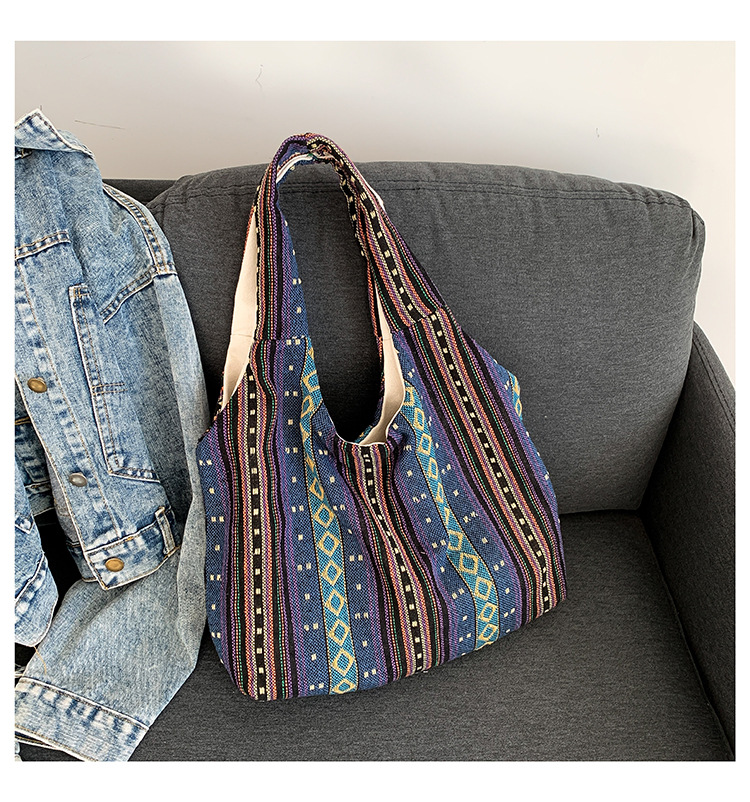 Estilo chino artístico de moda simple bolsa de mujer 2024 invierno nuevo estilo occidental todo partido hombro axila bolsa abierta