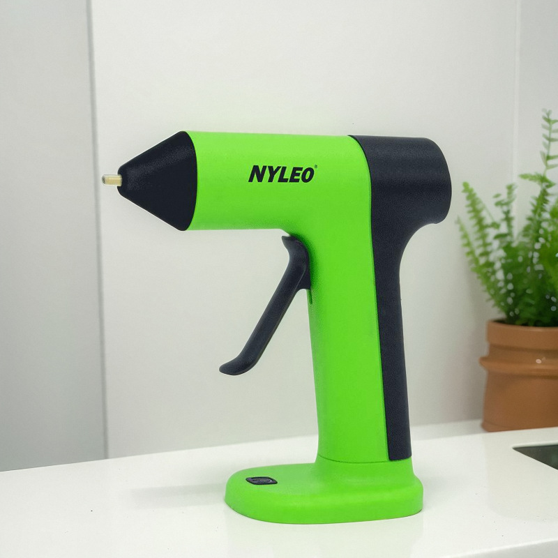 Pistola de pegamento termofusible inalámbrica Norio al por mayor batería de litio usb recargable pistola de pegamento desenchufable para el hogar hecha a mano para niños