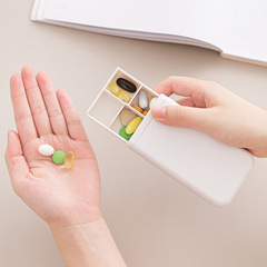 外国貿易の携帯ミニ7格の薬の箱の旅行は1週間の7日間の錠剤を持っています。