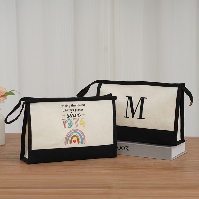 跨境帆布拉链零钱包个性字母印花大容量化妆包便携收纳手拿包定制