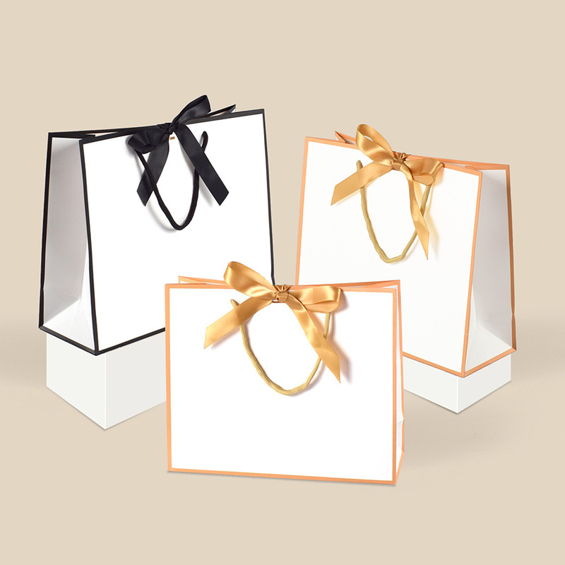 Ins Style Simple Golden Border Bow Gift Bag in stock Multi-size Black Edge Clothing Store Paper Handbag Ins Style Simple Golden Border Bow Gift Bag in stock Multi-size Black Edge Clothing Store Paper Handbag