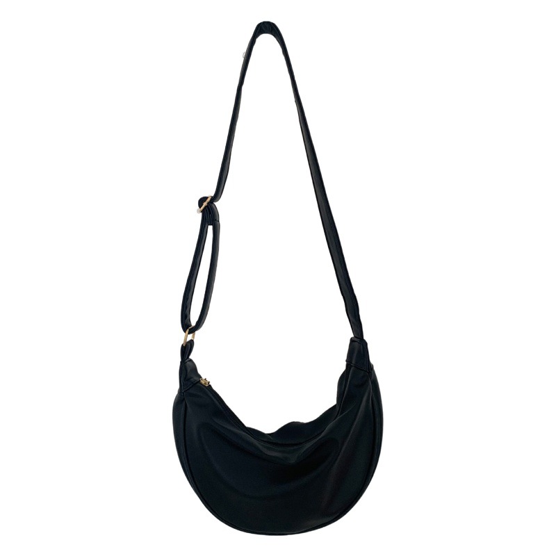 Otoño e Invierno versátil de alto grado de PU de cuero suave bolsa de dumpling mujeres estudiantes clase estilo coreano bolsa de hombro estilo japonés nicho bolsa de mensajero