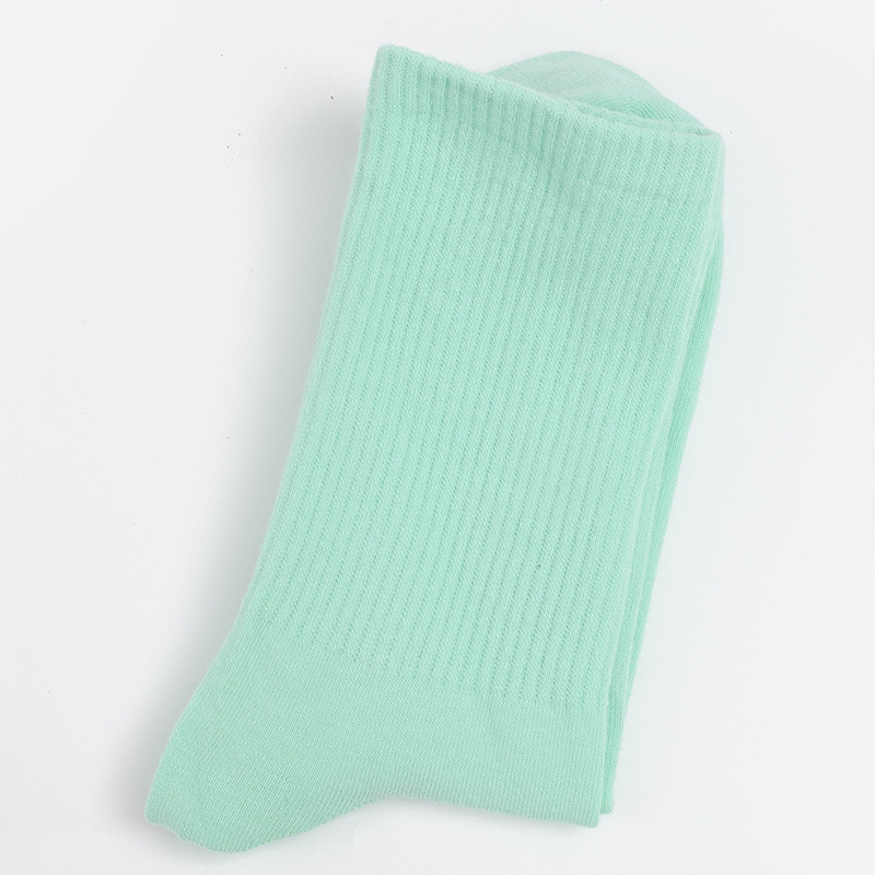 Calcetines de mujer para primavera y otoño, calcetines de algodón de color liso, versátiles y a la moda, calcetines holgados, calcetines de longitud media, calcetines deportivos que absorben el sudor, venta al por mayor.