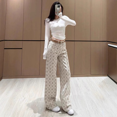 専門店の杏色の広脚ジーパンの女性2025の新型はとてもきれいです。