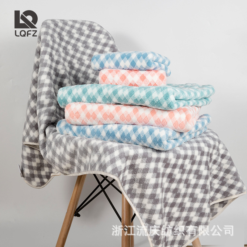 El borde de la toalla de lana de coral en forma de diamante cubierto no absorbente de algodón de alta densidad Toalla de cara entrega al por mayor