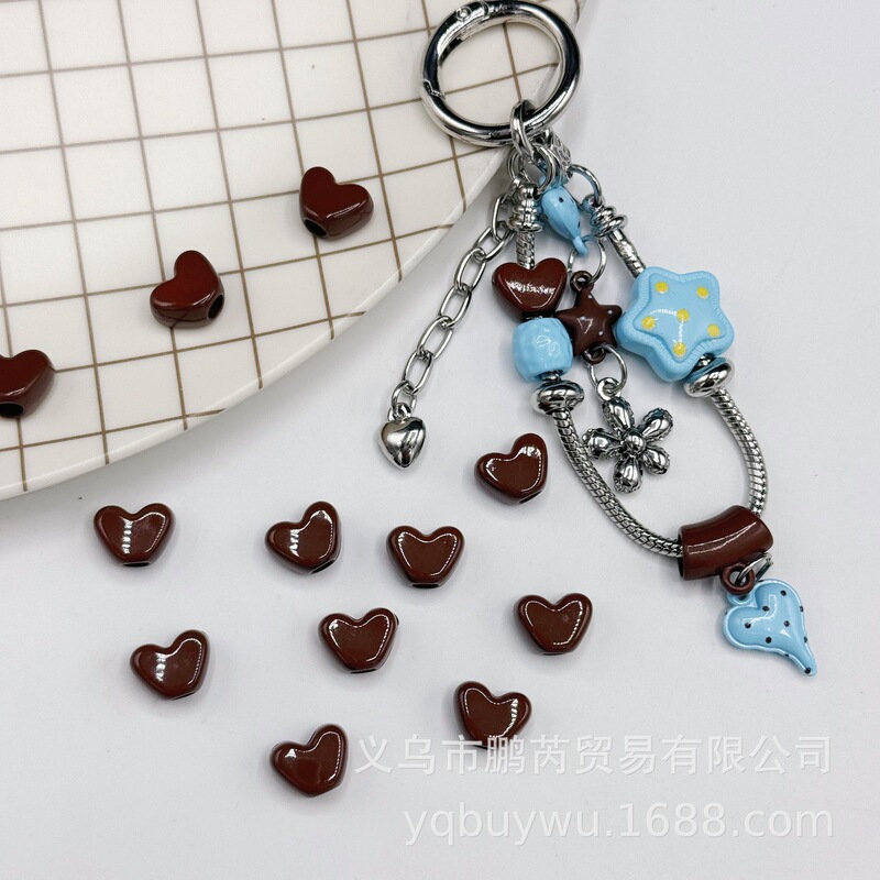 New autumn/winter collection: coffee-colored acrylic beads with large holes and irregular shapes, perfect for DIY phone chains, bracelets, keychains, and other accessories New autumn/winter collection: coffee-colored acrylic beads with large holes and irregular shapes, perfect for DIY phone chains, bracelets, keychains, and other accessories