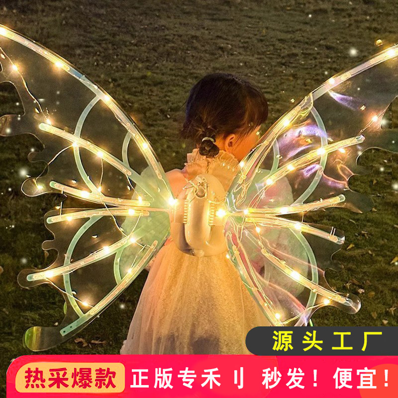 El genio de las alas luminosas eléctricas totalmente automáticas luminosas se moverán mariposa accesorios de espalda con lámpara juguetes para niños y niñas