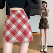 毛呢半身裙2025秋冬新款短裙女高腰显瘦小个子A字复古格子包臀裙