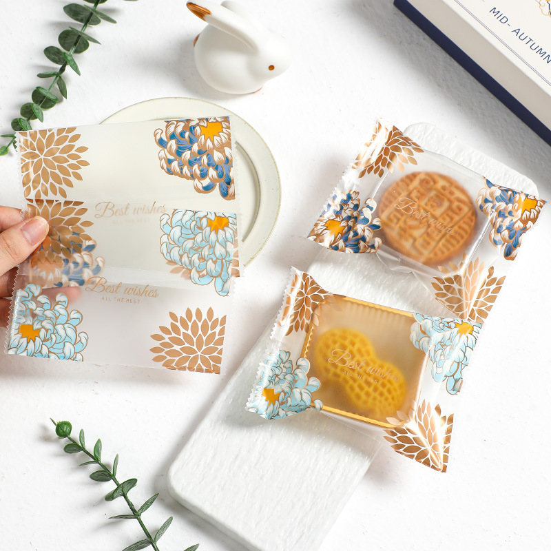 Nueva bolsa de embalaje de pastel de Luna 50g100G bolsa de pastel de Luna máquina bolsa de sello Festival del Medio Otoño flujo corazón yema de huevo crujiente pastel de Luna embalaje al por mayor