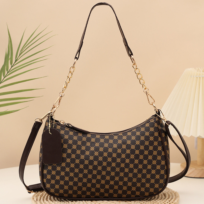 2025 nuevo bolso de mujer nuevo bolso de impresión personalidad bolso de hombro de moda bolso de maquillaje de viaje al comercio exterior lote
