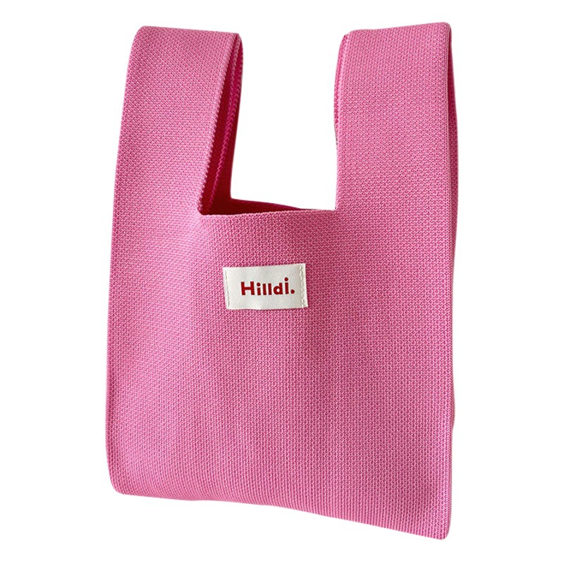 Bolso de las mujeres de estilo coreano diseño de nicho de color caramelo de punto bolso de mano versátil color sólido de gran capacidad bolso de la muñeca