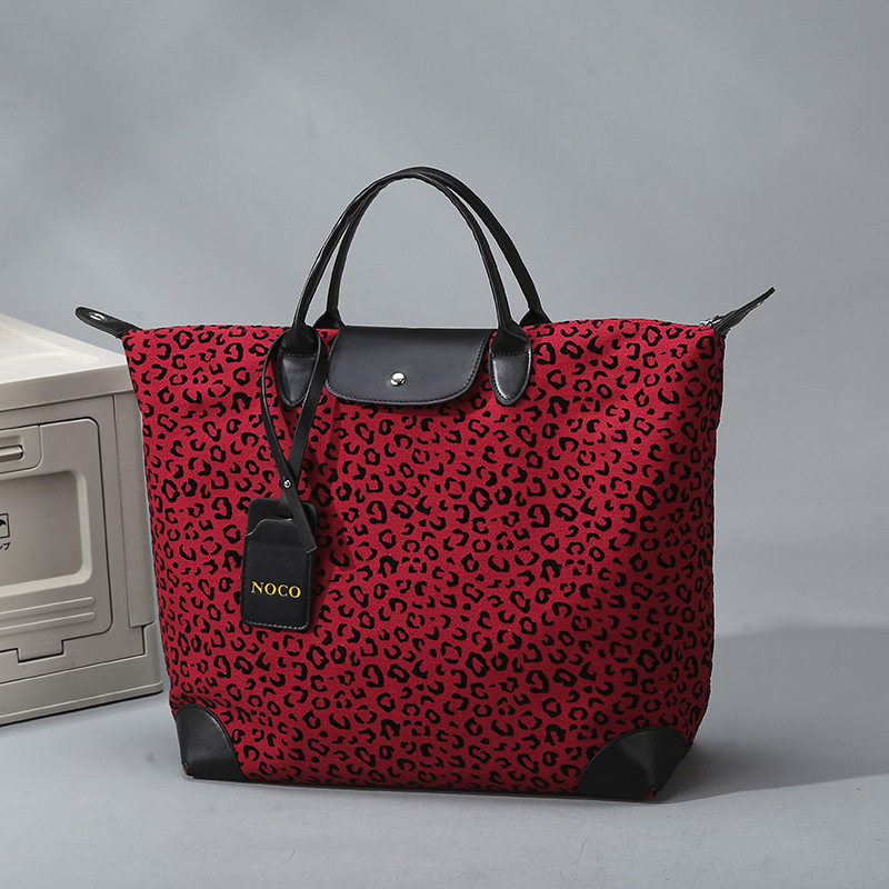 Bolsa de viaje de leopardo transfronterizo, bolsa de yoga, bolsa deportiva de ocio de gran capacidad para mujeres, bolsa de musculación de moda europea y americana.